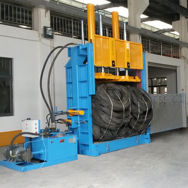 Bale Press Strapping in Recycling of Tires and Rubber Materials